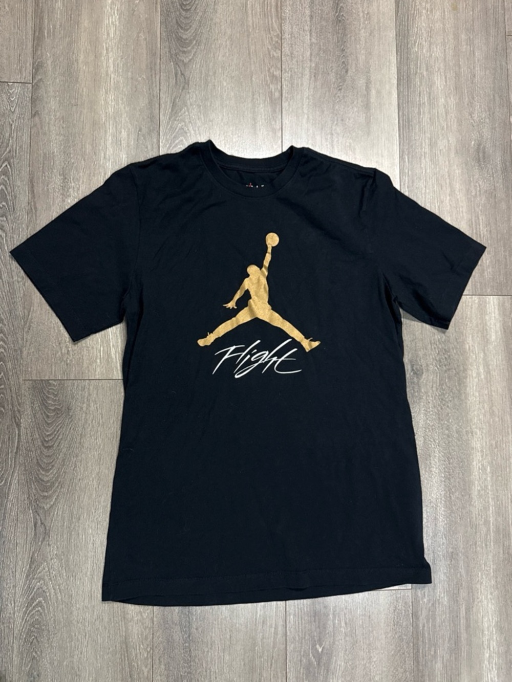 Jordan Jumpman Flight M Black Tee with Gold Jumpman and White Flight Script